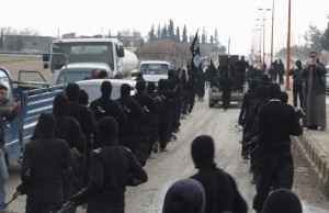 Fighters of al-Qaeda linked Islamic State of Iraq and the Levant parade at Syrian town of Tel Abyad