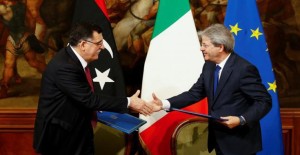 5894f0a7033d3assarraj-jentiloni030217-jpg