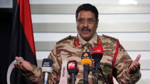 Spokesman of Libyan National Army (LNA) colonel Ahmed Al Masmary gestures during a news conference in Benghazi